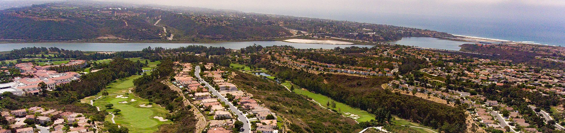 Aviara Point from above, with the Aviara golf course and the ocean beyond